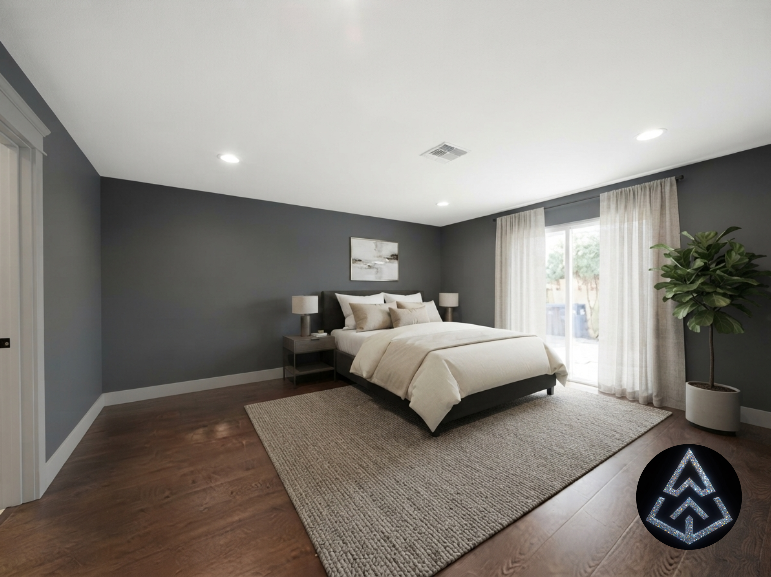 Master bedroom with gray walls, upholstered bed, matching nightstands and lamps, and a sliding glass door to the patio